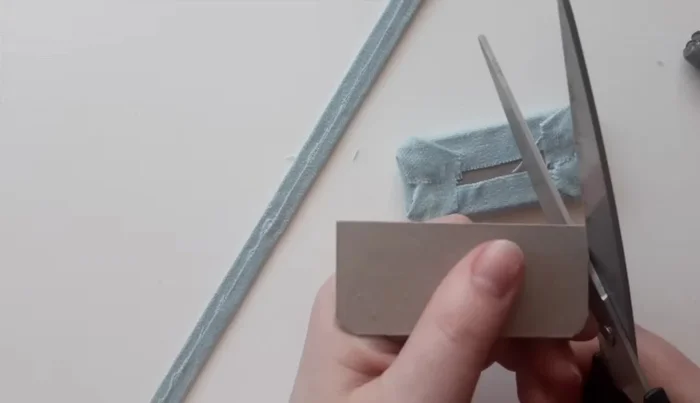 Glue trim to sides, concealing join at the back.