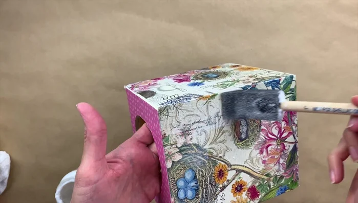 Apply two coats of a clear acrylic sealer (Mod Podge Super High Shine) outdoors, allowing 10 minutes of drying time between coats. 