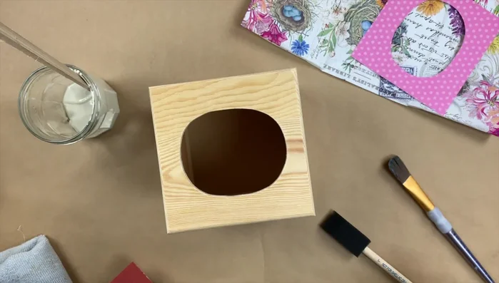 Gently sand the box to smooth any rough edges. 