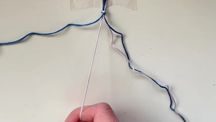 Repeat rows: Continue knotting rows, creating the candy stripe pattern. Monitor the length of the bracelet to ensure it fits your wrist.