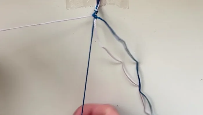 Repeat rows: Continue knotting rows, creating the candy stripe pattern. Monitor the length of the bracelet to ensure it fits your wrist.