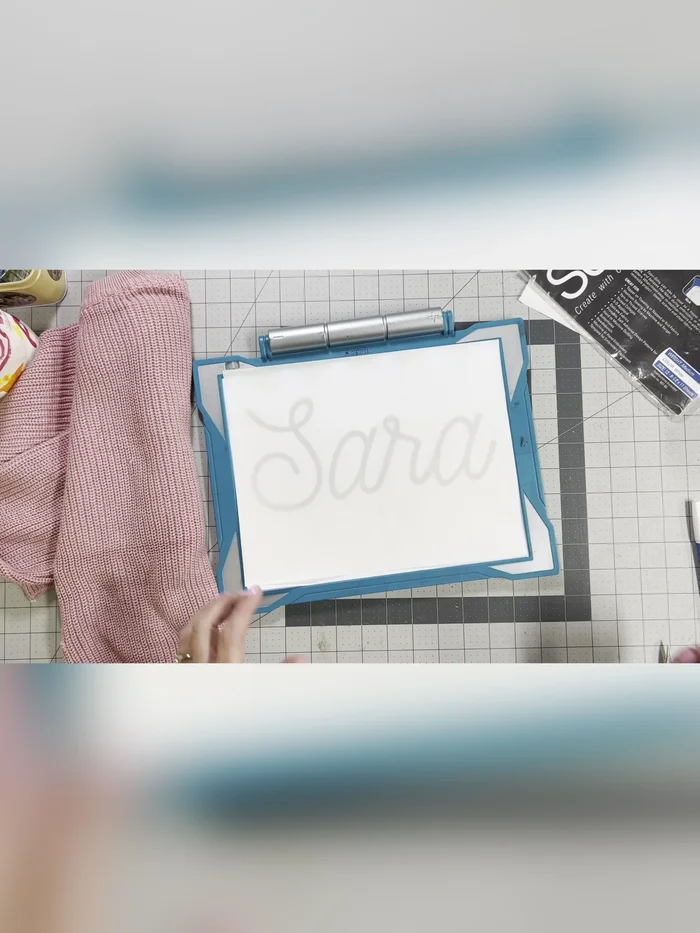 Lightly trim the excess stabilizer, leaving a generous border around your name.