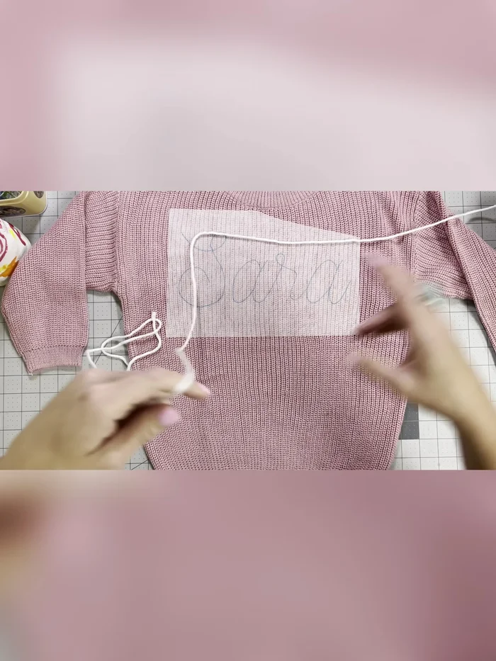 Thread a darning needle with a 45-50 inch length of yarn. Triple knot the end.