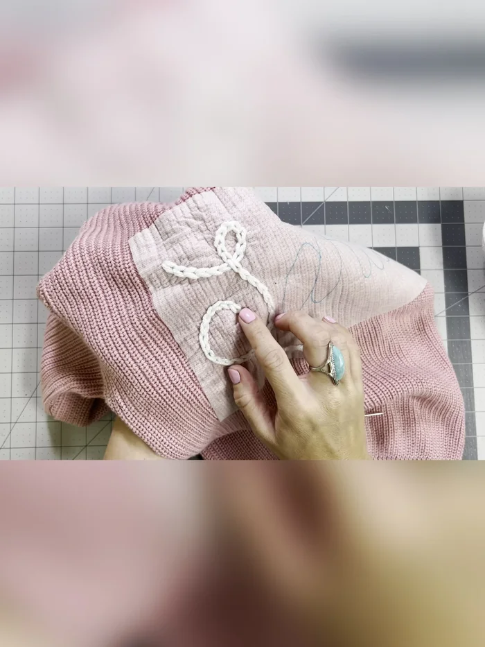 To tie off: Insert needle just outside the last loop, pull through, and weave the tail through the previous two or three stitches on the back. Double knot and cut the excess yarn.