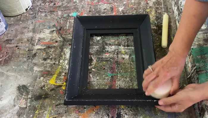 Apply candle wax to areas where you want the paint to chip (edges, corners). Rub aggressively for a more chippy look.