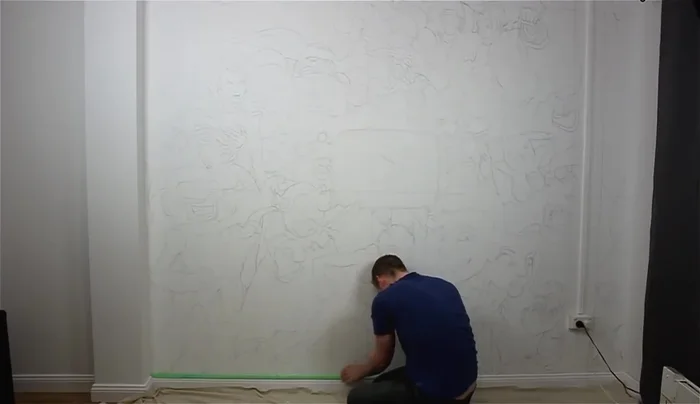 Prepare for painting: Tape around the edges of the mural area and place a drop sheet on the floor.