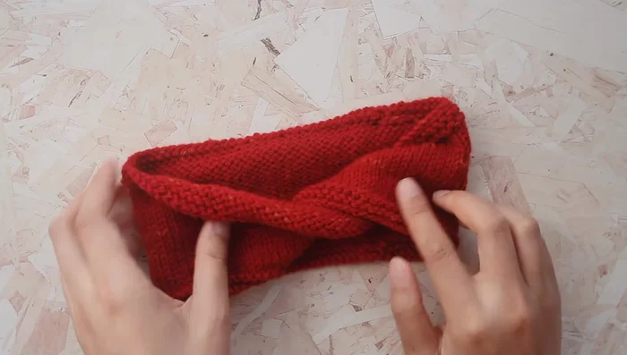 Stretch your cast-on stitches to nearly reach the needle tips.