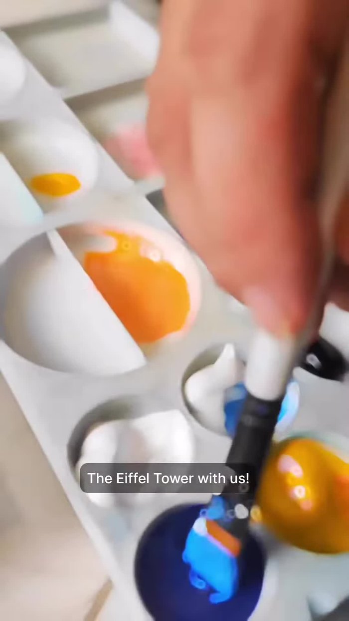 Paint the sunset sky using blush pink, then layer with bright orange.