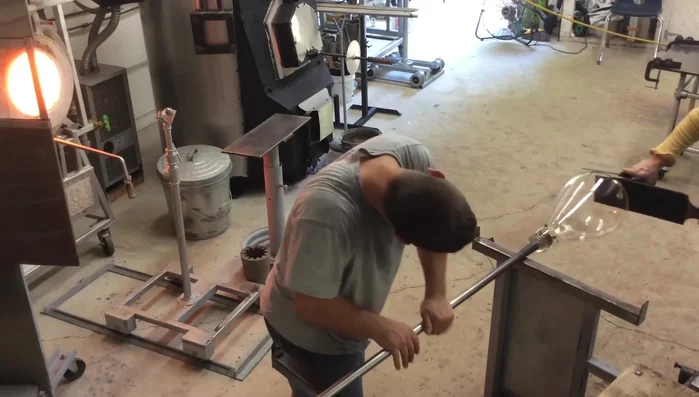 Use jacks and a paddle to shape the bottom edge and make it flat.