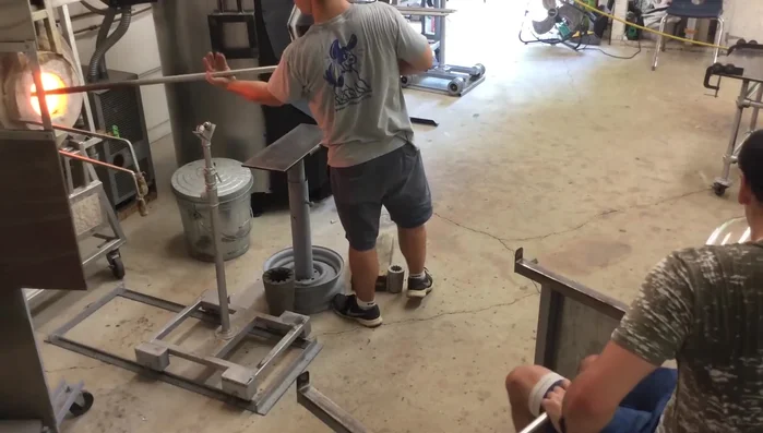 Carefully break the piece off the pipe using water to shock the connection and a paddle to apply force.