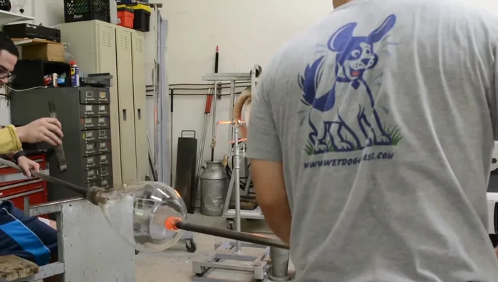 Carefully break the piece off the pipe using water to shock the connection and a paddle to apply force.