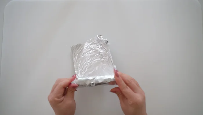 Wrap the last floral wire around the top of the foil body; this is where the wings will attach.