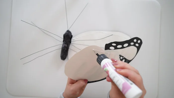 Shape the wings by slightly curving them and adjusting with the floral wire. You can leave them flat or angle them upwards.