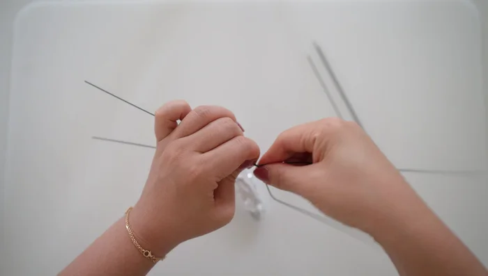 Wrap the last floral wire around the top of the foil body; this is where the wings will attach.