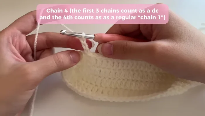 Repeat step 9 for each subsequent round, working into the V-stitch spaces until the bag reaches the desired height.