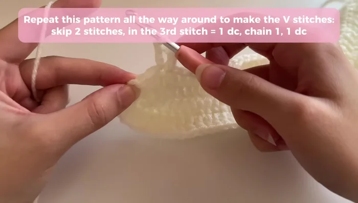 Repeat step 9 for each subsequent round, working into the V-stitch spaces until the bag reaches the desired height.