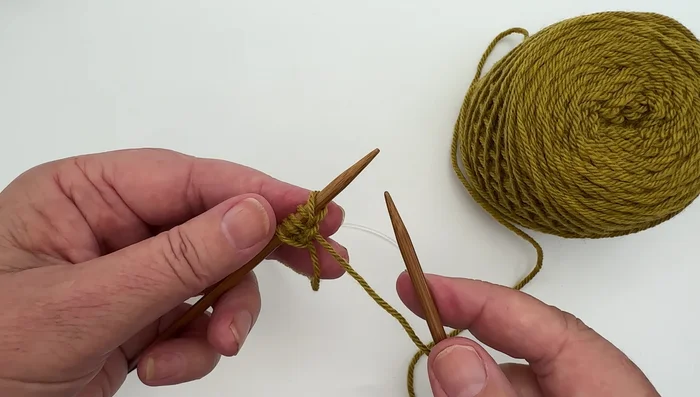 Continue casting on until you reach the desired number of stitches (e.g., 30 for practice, 170 for the blanket).