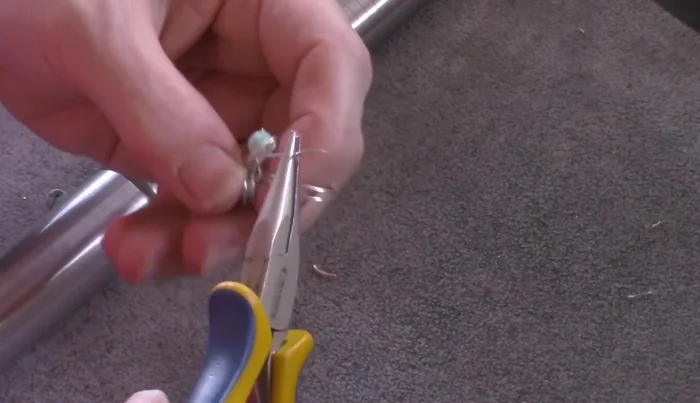 Trim excess wire and tuck in the ends, making sure the coils are neat and tight.