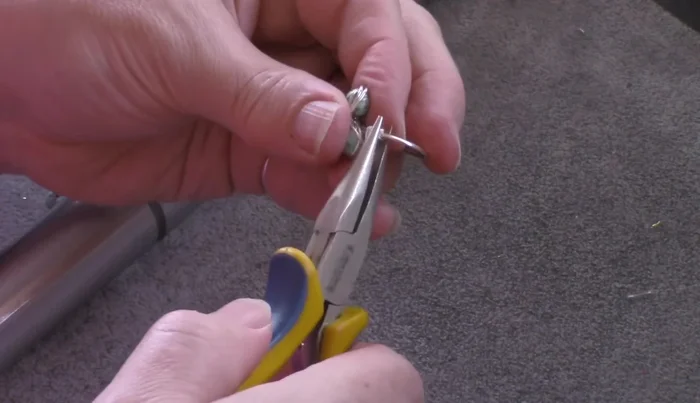 Trim excess wire and tuck in the ends, making sure the coils are neat and tight.