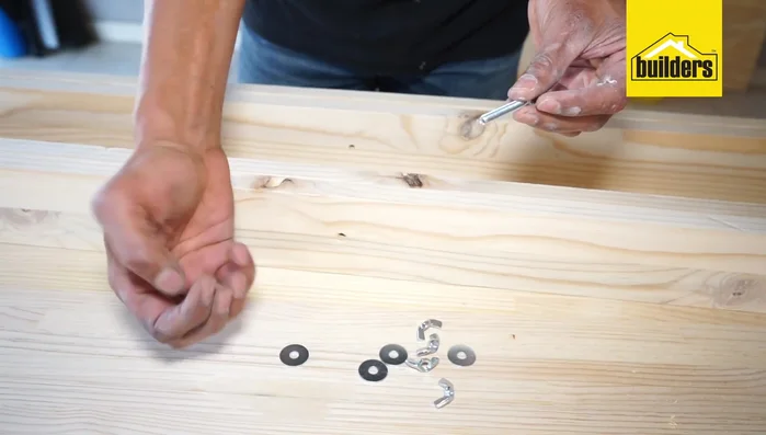 Assemble the sides using one 6cm bolt, three washers per side, and one butterfly nut per side.