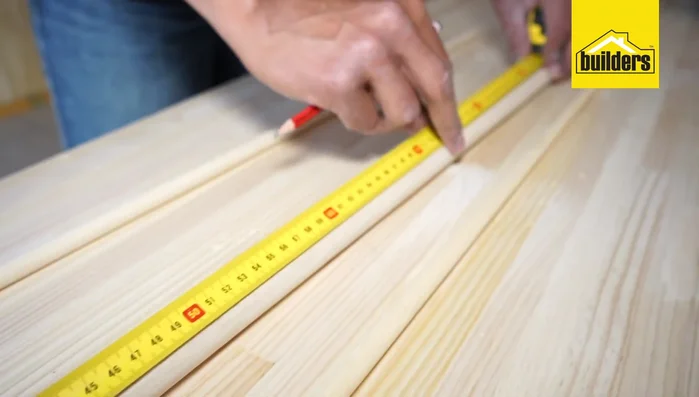 Mark and drill holes 3cm from the ends of the 12mm dowels.