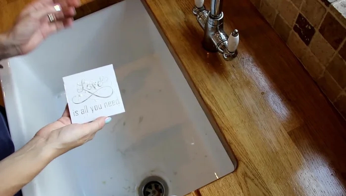 Wash the coaster thoroughly with cold water and dry with a kitchen towel.