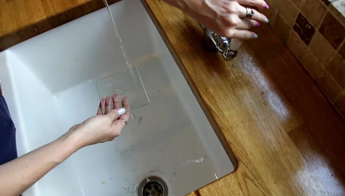 Wash the coaster thoroughly with cold water and dry with a kitchen towel.