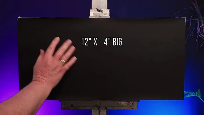 Apply a thin layer of Bob Ross Liquid Clear or linseed oil. Wipe off excess.