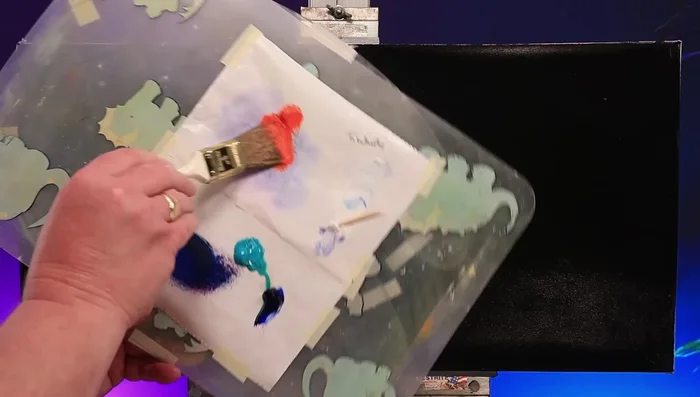 Add more colors (turquoise, etc.), building layers and blending as you go to create a vivid, nebula-like effect.