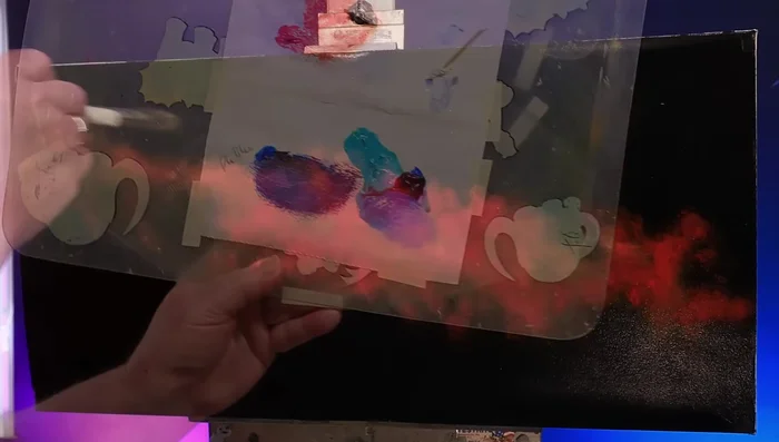 Add more colors (turquoise, etc.), building layers and blending as you go to create a vivid, nebula-like effect.