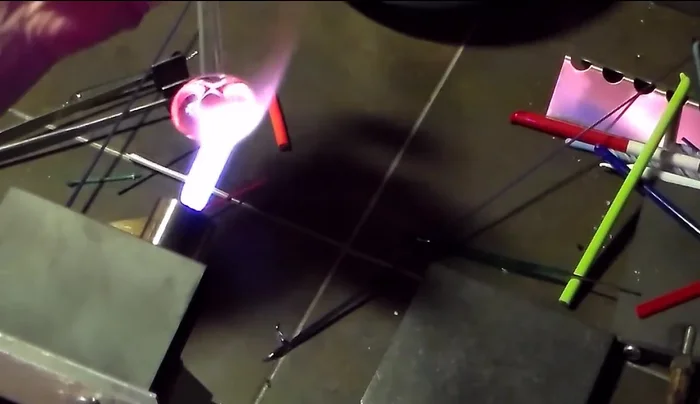 Flatten the disc again ensuring it is evenly flat and centered on the rod.