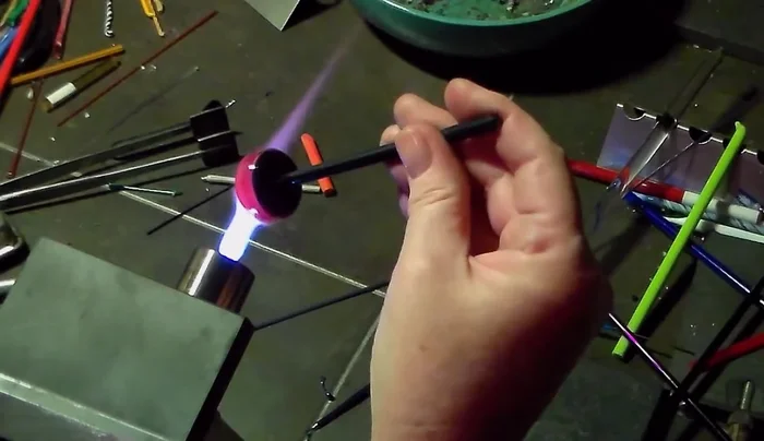 Attach a bail to the top of the pendant.