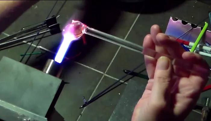 Flatten the disc again ensuring it is evenly flat and centered on the rod.