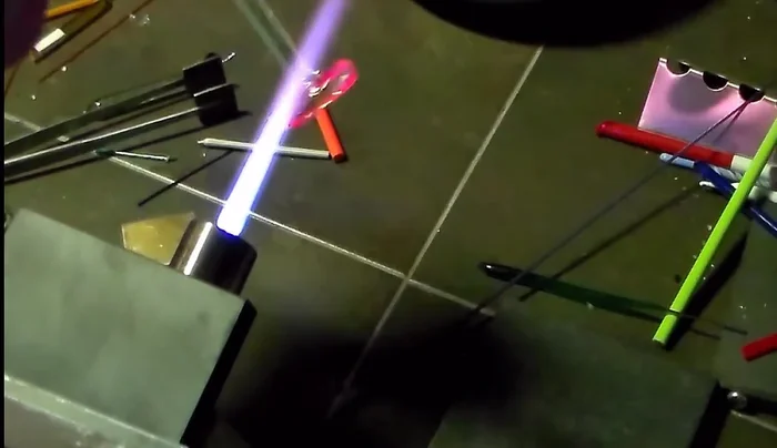 Continue the implosion process, heating and gently pressing until the petals are raised and the bottom is flat.