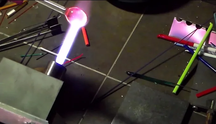 Flatten the disc again ensuring it is evenly flat and centered on the rod.