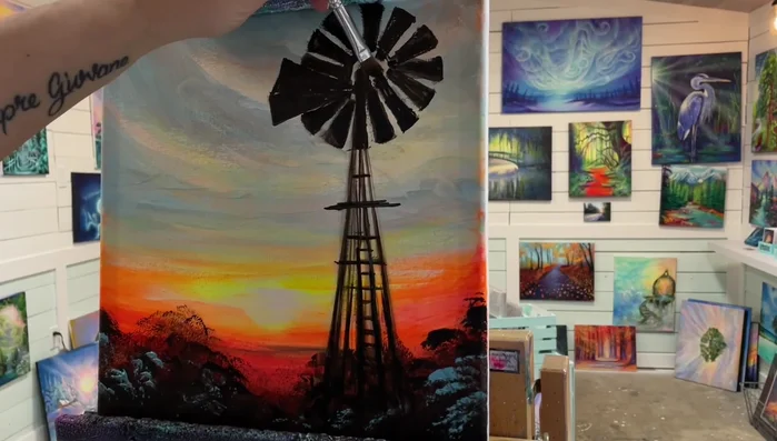 Add final details to the windmill: Create a wider circle in the center, use white paint for spaces in between windmill pieces, and add highlights to balance the light.
