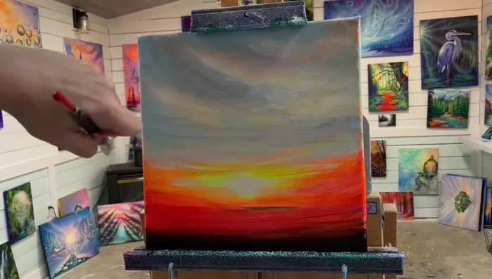 Add more details to the sunset: Add more yellow to increase saturation. Overlapping yellow with blue will create green, so consider adding small amounts of orange to tint the yellow and white.