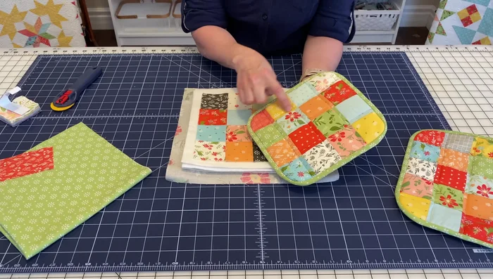 Quilt the layers: Use a sewing machine (walking foot recommended) with a stitch length of 3.5 to quilt across the seams. For a more even result sew along the vertical and horizontal lines of your 4x4 grid. 