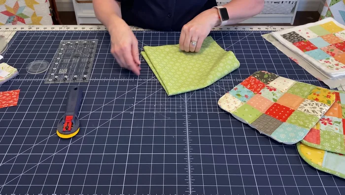 Make the bias binding: Create a bias binding strip from an 18-inch square of fabric. (Refer to a separate video tutorial for details)