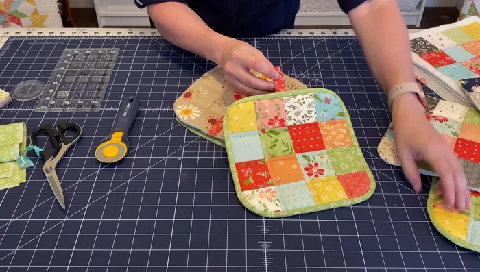 Optional: Add a hanging tab. Create a 2.5x5-inch rectangle and fold it lengthwise, press, and sew along one side.