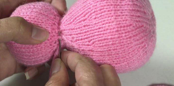 Indent the neck by using a simple running stitch around the neck area.