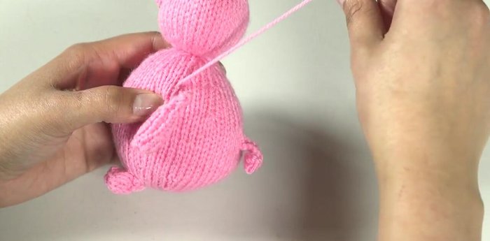 Join arms and legs using a combination of mattress stitch and over sewing. Prioritize the back seam at the center back. Pin pieces first before sewing.