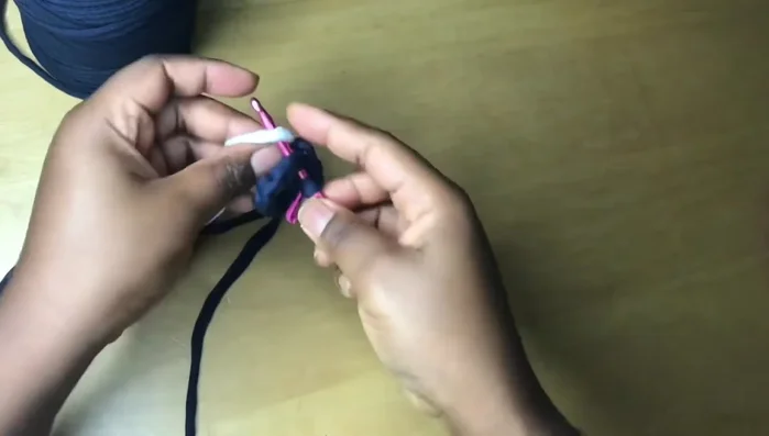 Continue changing colors, making two single crochets in each stitch until the end of the round (16 single crochets total).