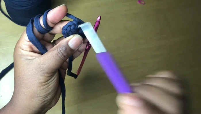 Join the circle with a single crochet into the first single crochet of the seven.