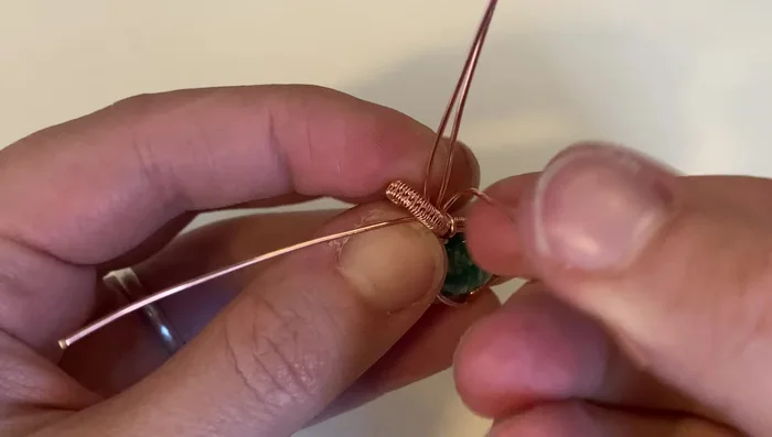 Secure the remaining base wires to the frame.