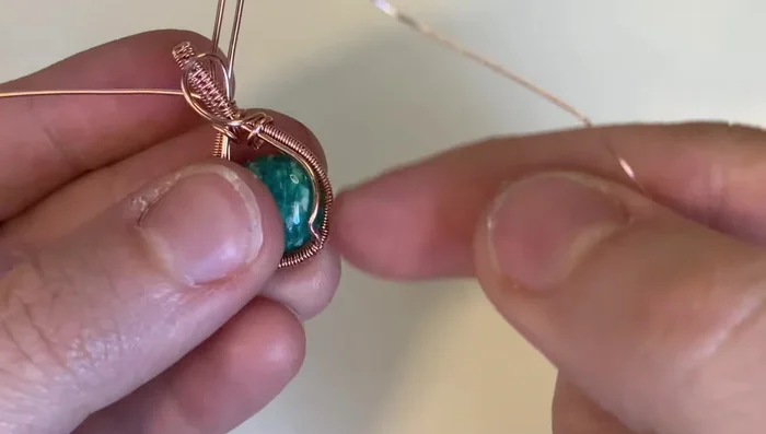 Secure the remaining base wires to the frame.