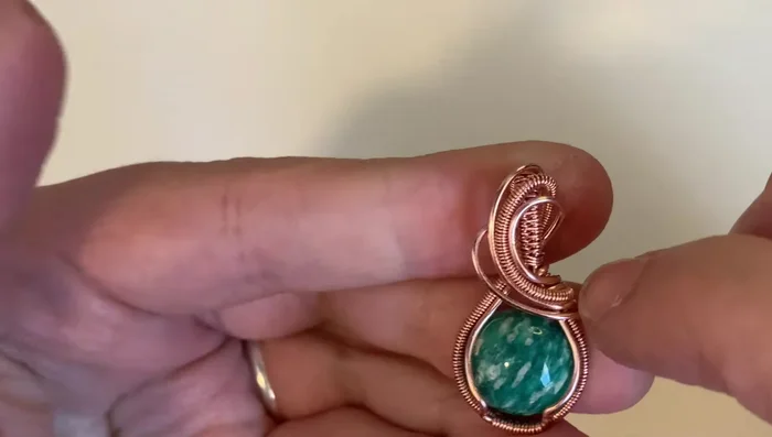 Secure the remaining base wires to the frame.