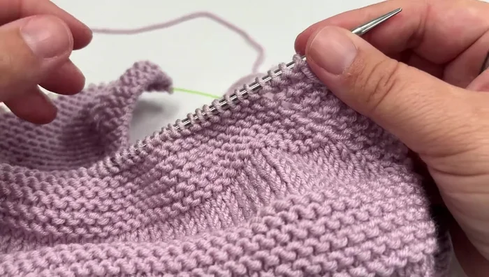 Continue alternating Garter and Stockinette decrease sections until seven stitches remain.