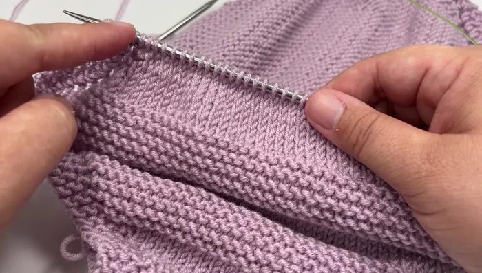 Continue alternating Garter and Stockinette decrease sections until seven stitches remain.