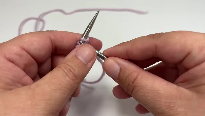 Work four setup rows to create a neat corner (detailed instructions provided in the video).